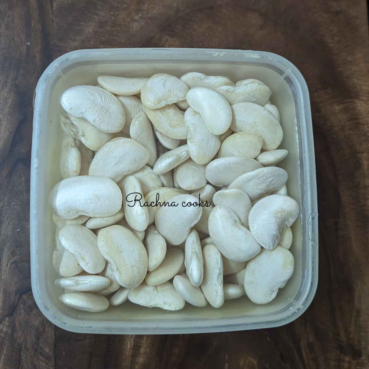 Dried butter beans soaked in water