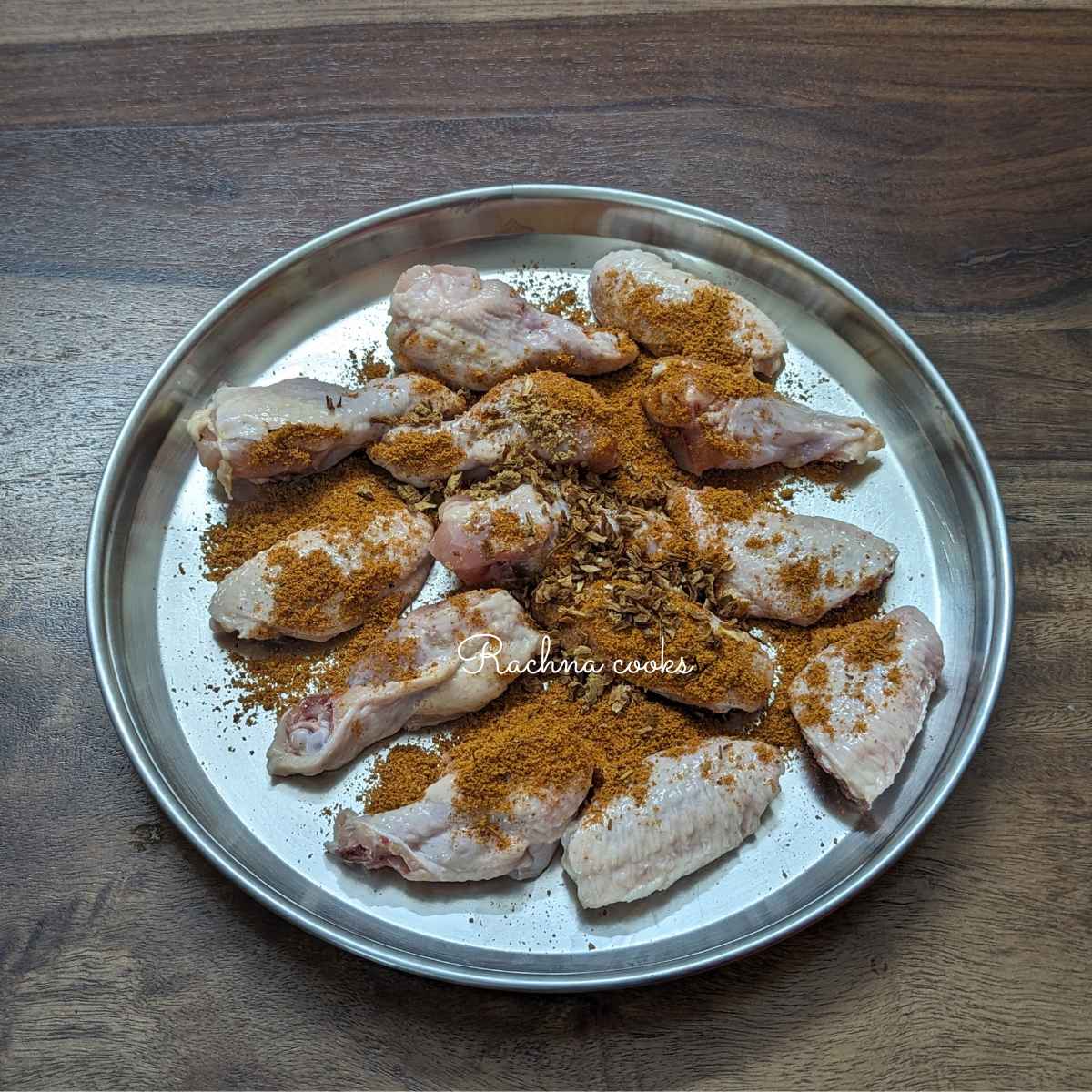 Chicken wings with seasonings.