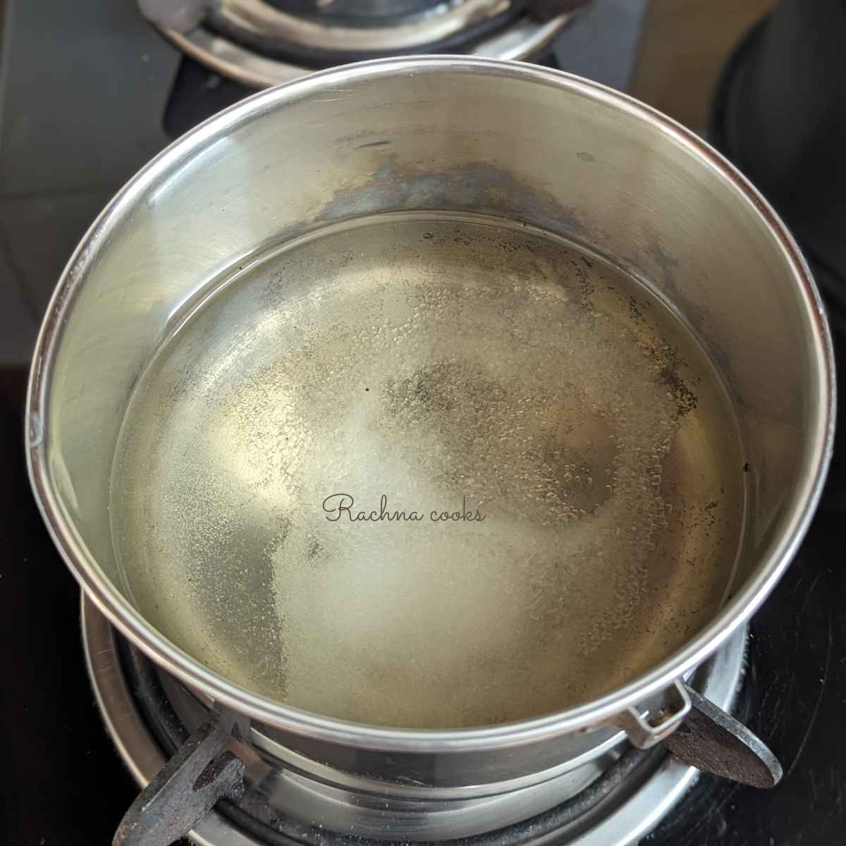 Preparing pickling liquid in a pan.