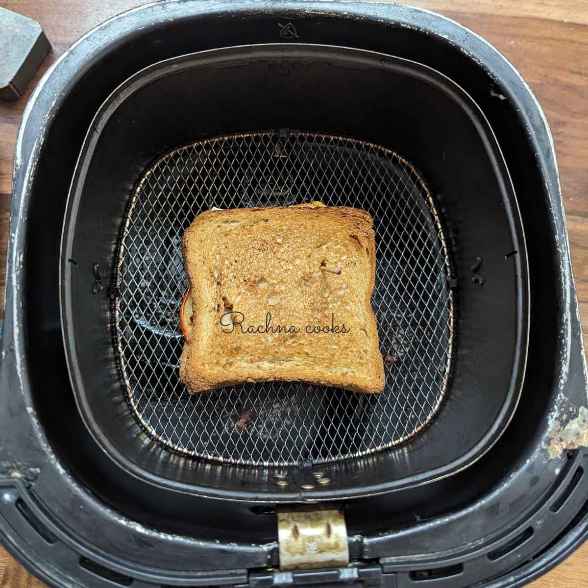 Air fryer sandwich in basket.