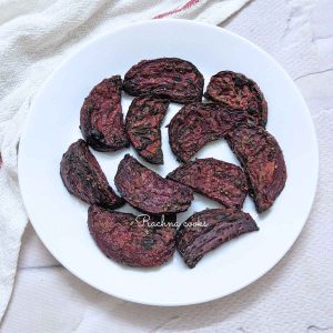 Roasted beets served on a white plate