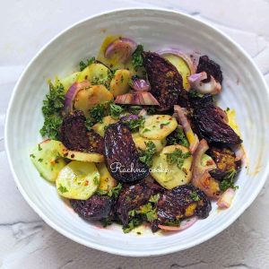 Cucumber beetroot salad in a white bowl