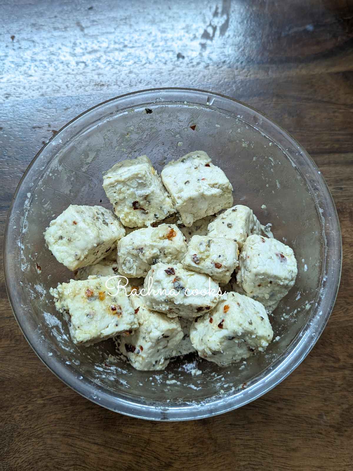 Tofu cubes coated with cornstarch and spices.