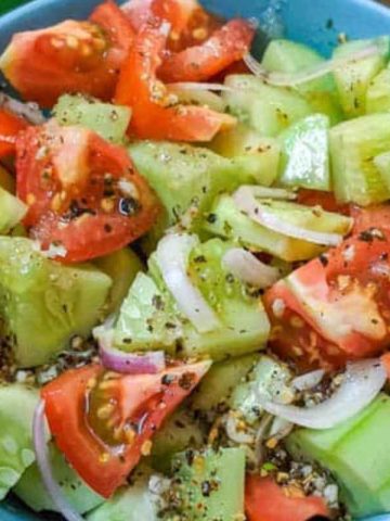 Cucumber and tomato salad in a bowl