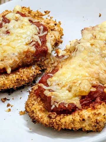 2 chicken parmesan on a plate