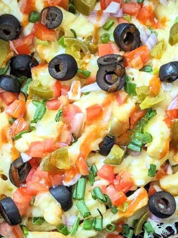 Loaded fries in air fryer basket