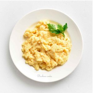 Delicious scrambled eggs on a plate