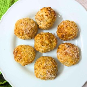 Delicious banana donut holes on a white plate