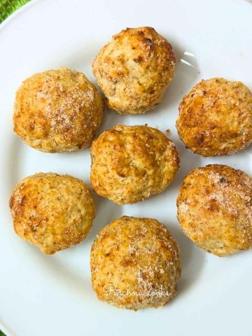 Delicious banana donut holes on a white plate