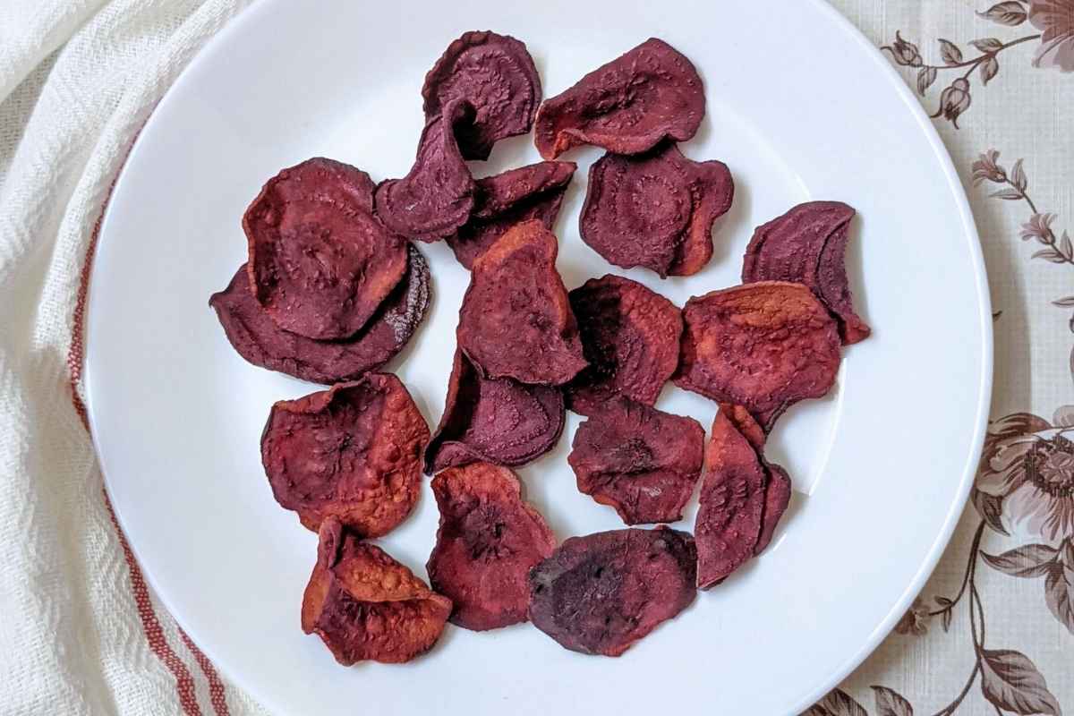 Air fried beet chips on a plate