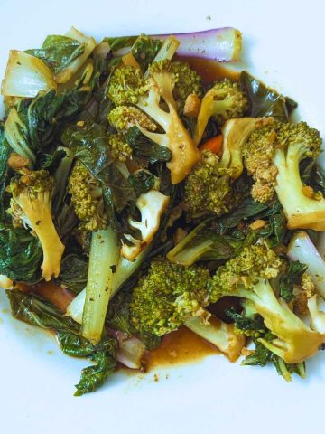 bok choy and broccoli stir fry on a plate