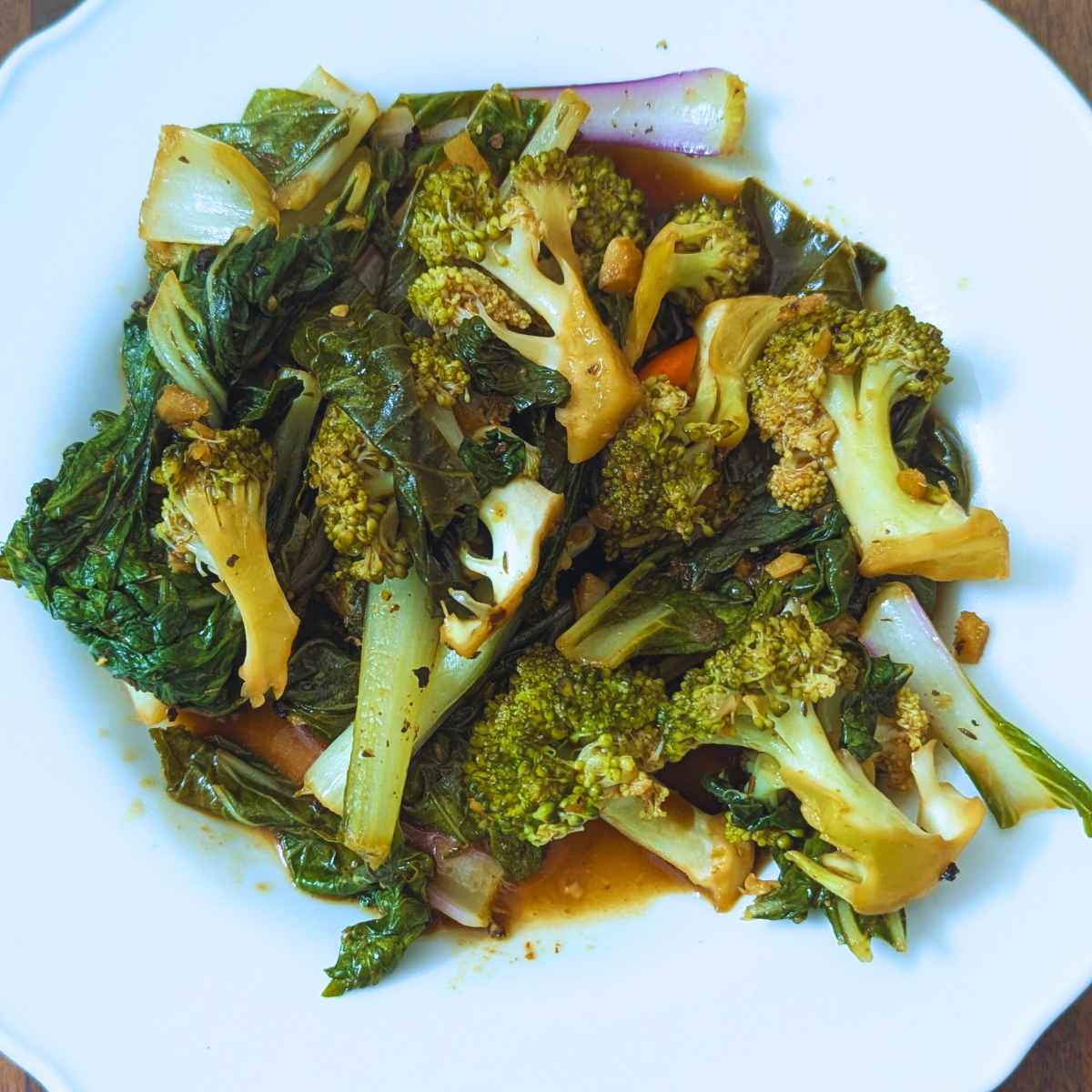 bok choy and broccoli stir fry on a plate