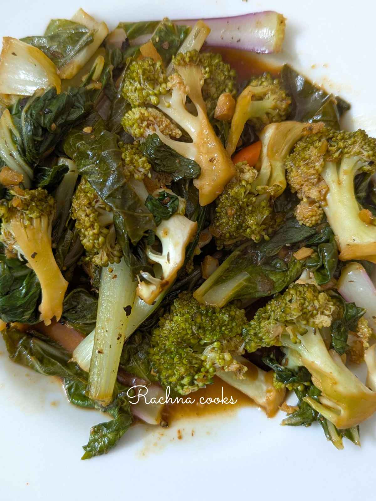 bok choy and broccoli stir fry on a plate