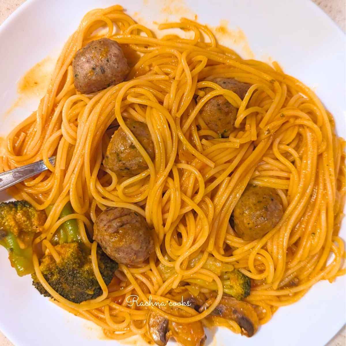 Chicken meatballs with pasta on a plate