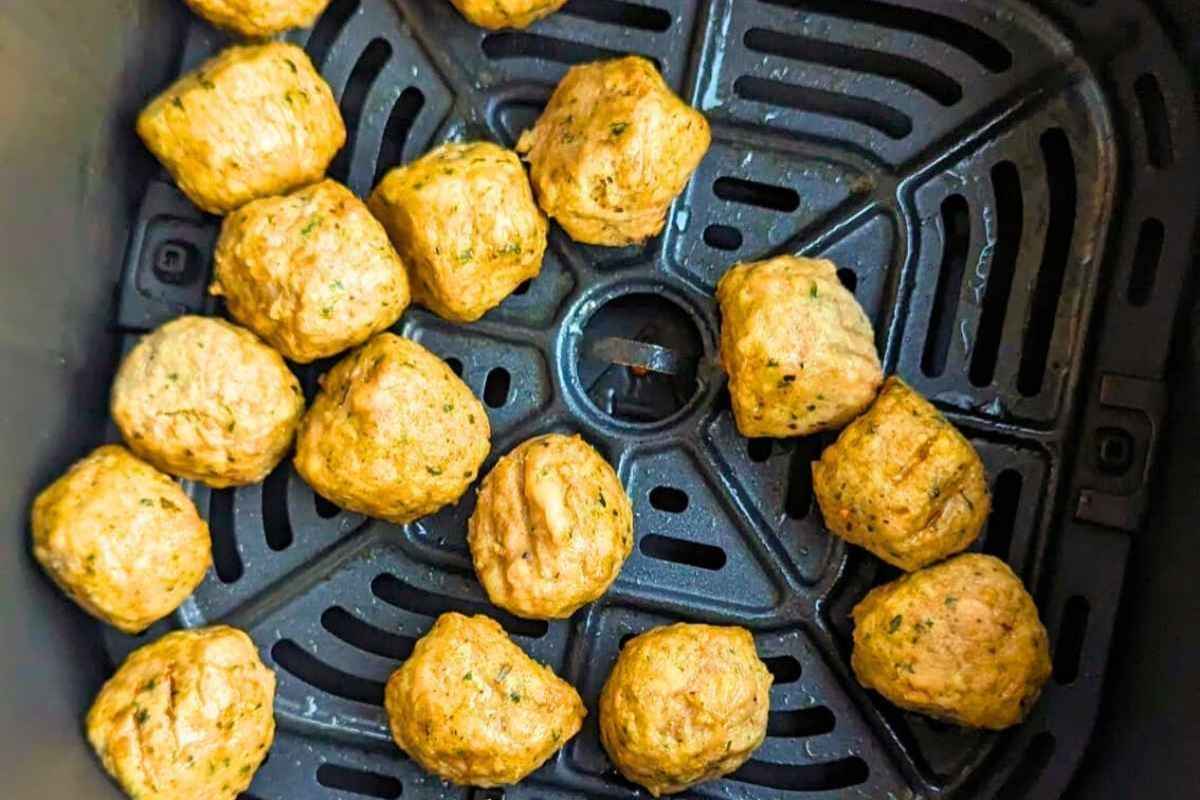 Chicken meatballs in air fryer basket