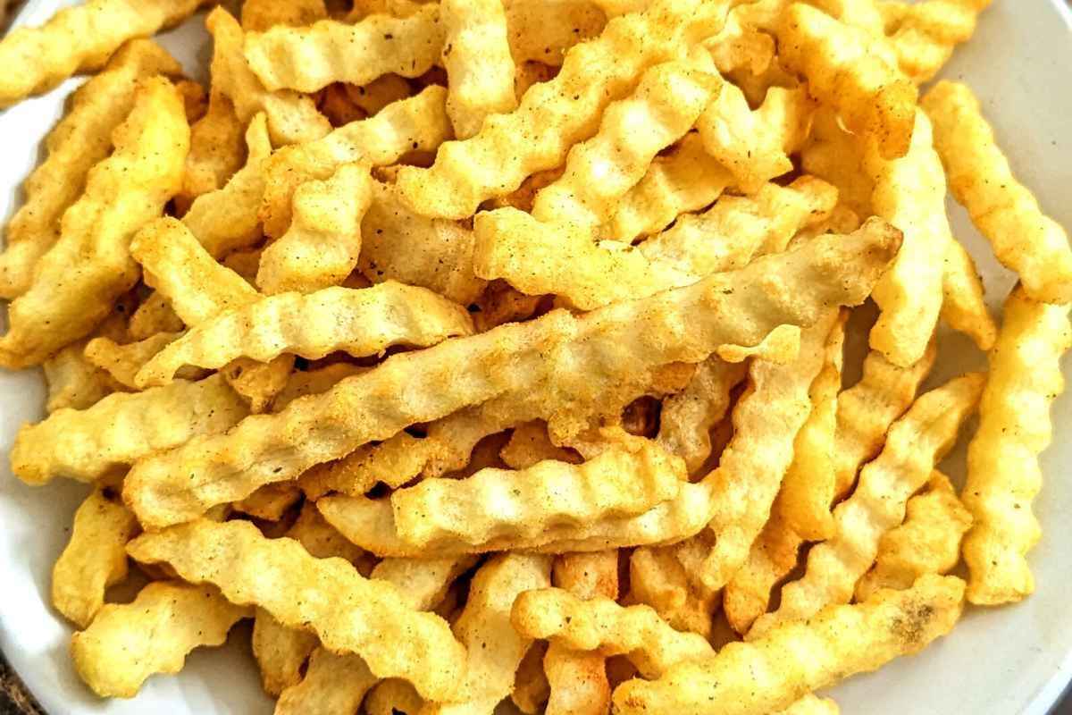 Crinkle cut fries on a plate