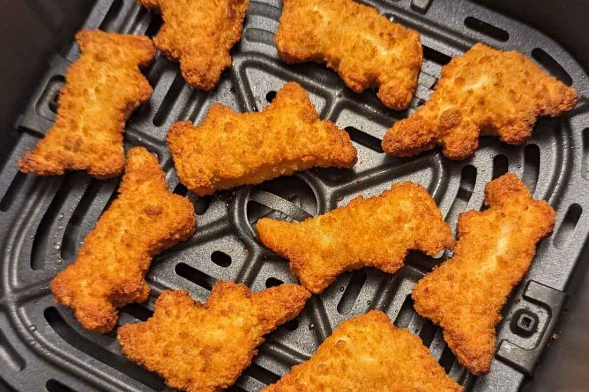 Delicious dino nuggets in air fryer basket