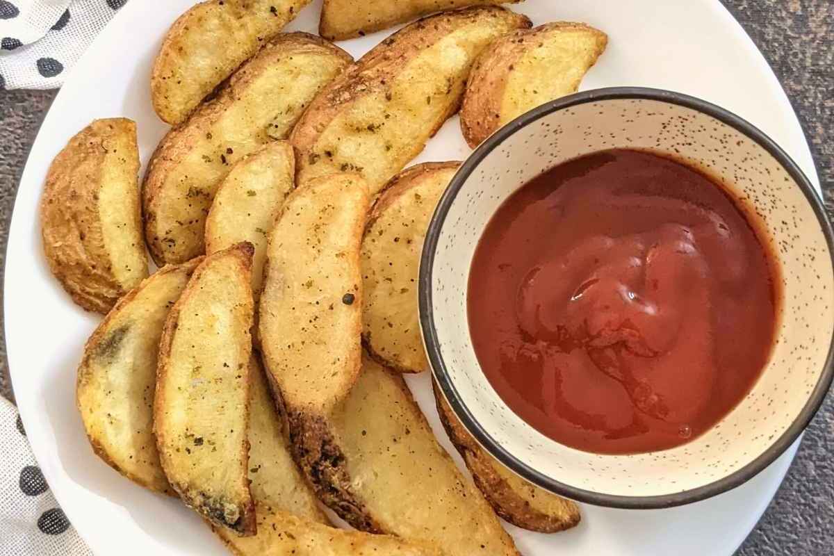 Potato wedges on a white plate