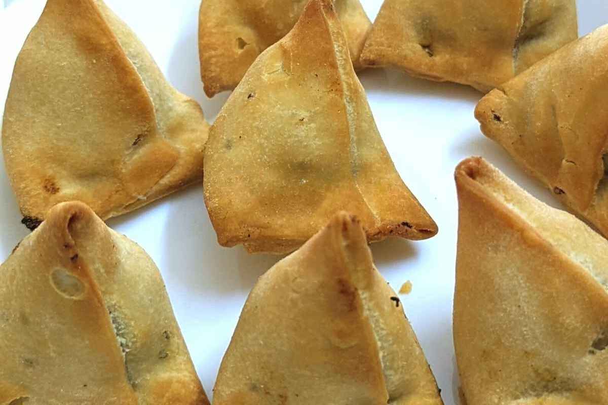 Frozen samosas on a plate