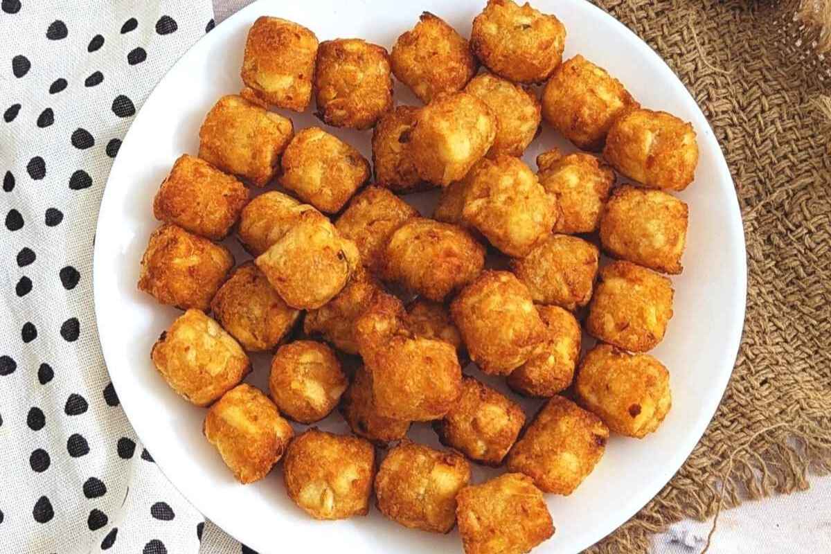 Air fried tater tots on a plate