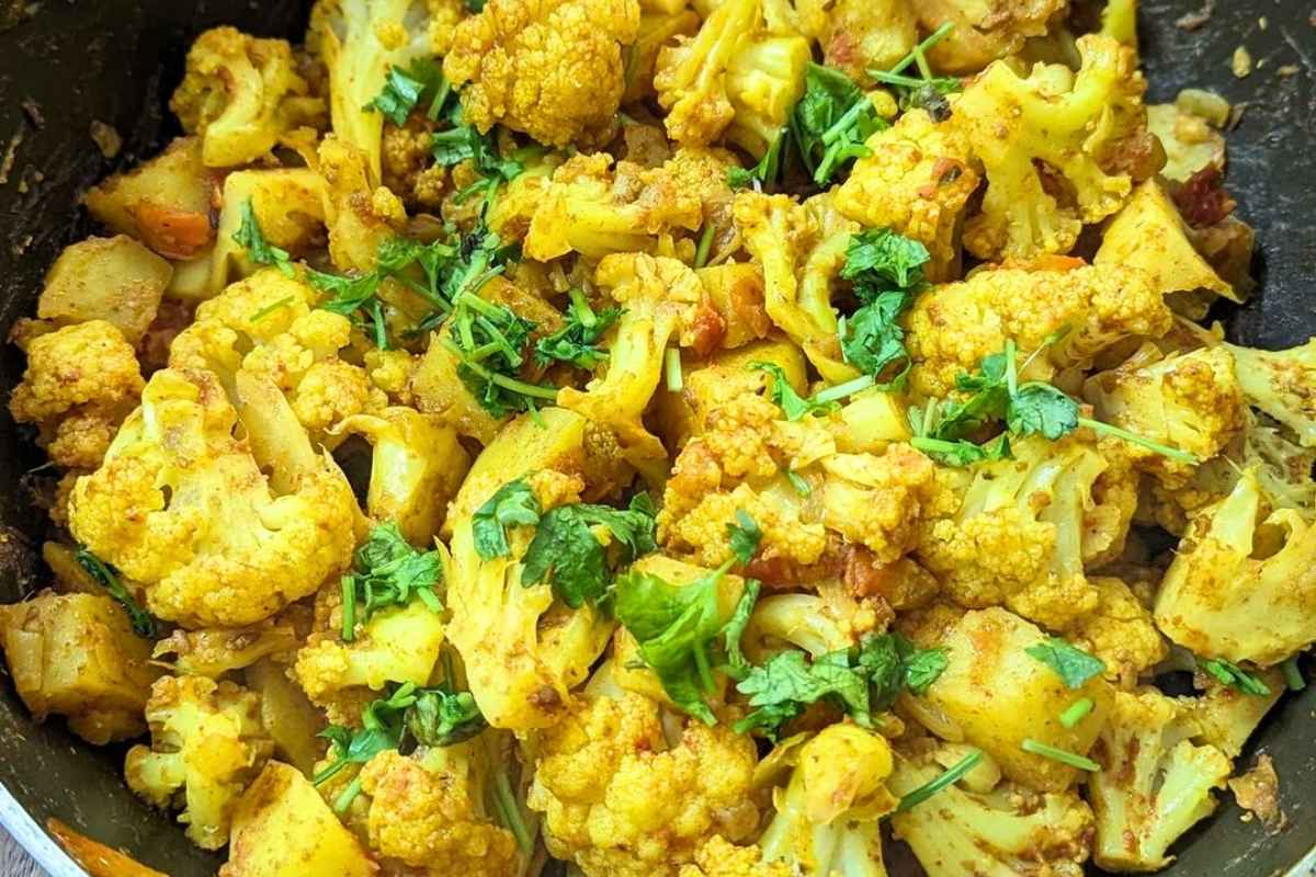 Closeup of aloo gobi in a pan