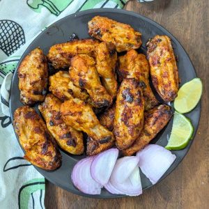 Tandoori chicken wings served on a plate