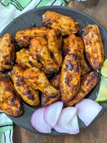 Tandoori chicken wings served on a plate