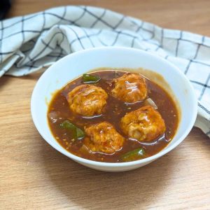 Chicken Manchurian curry served in a bowl