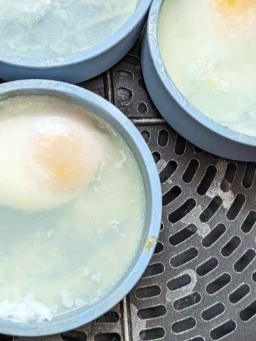 Poached eggs in silicome cups in air fryer basket