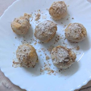 Air fryer donut holes on a white plate