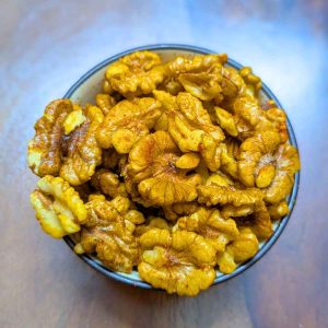 Air fried walnuts in a bowl