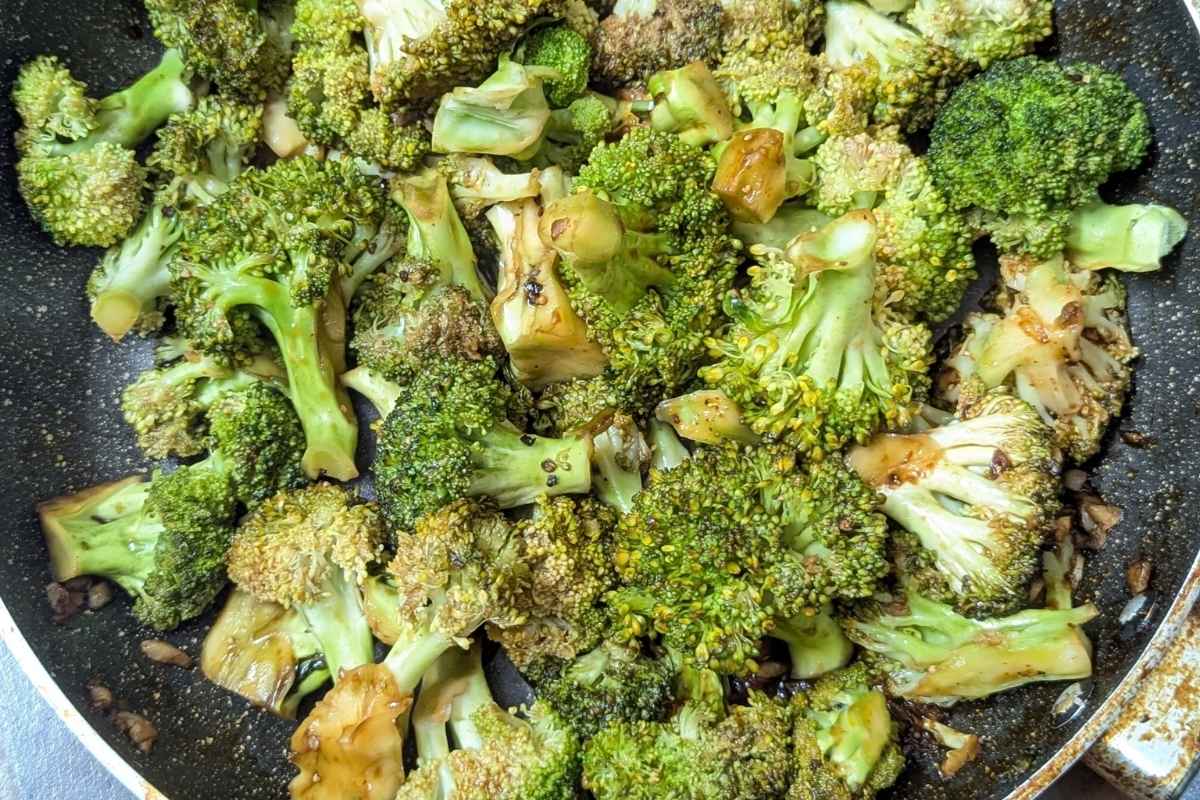 Garlic broccoli stir fry in a frying pan