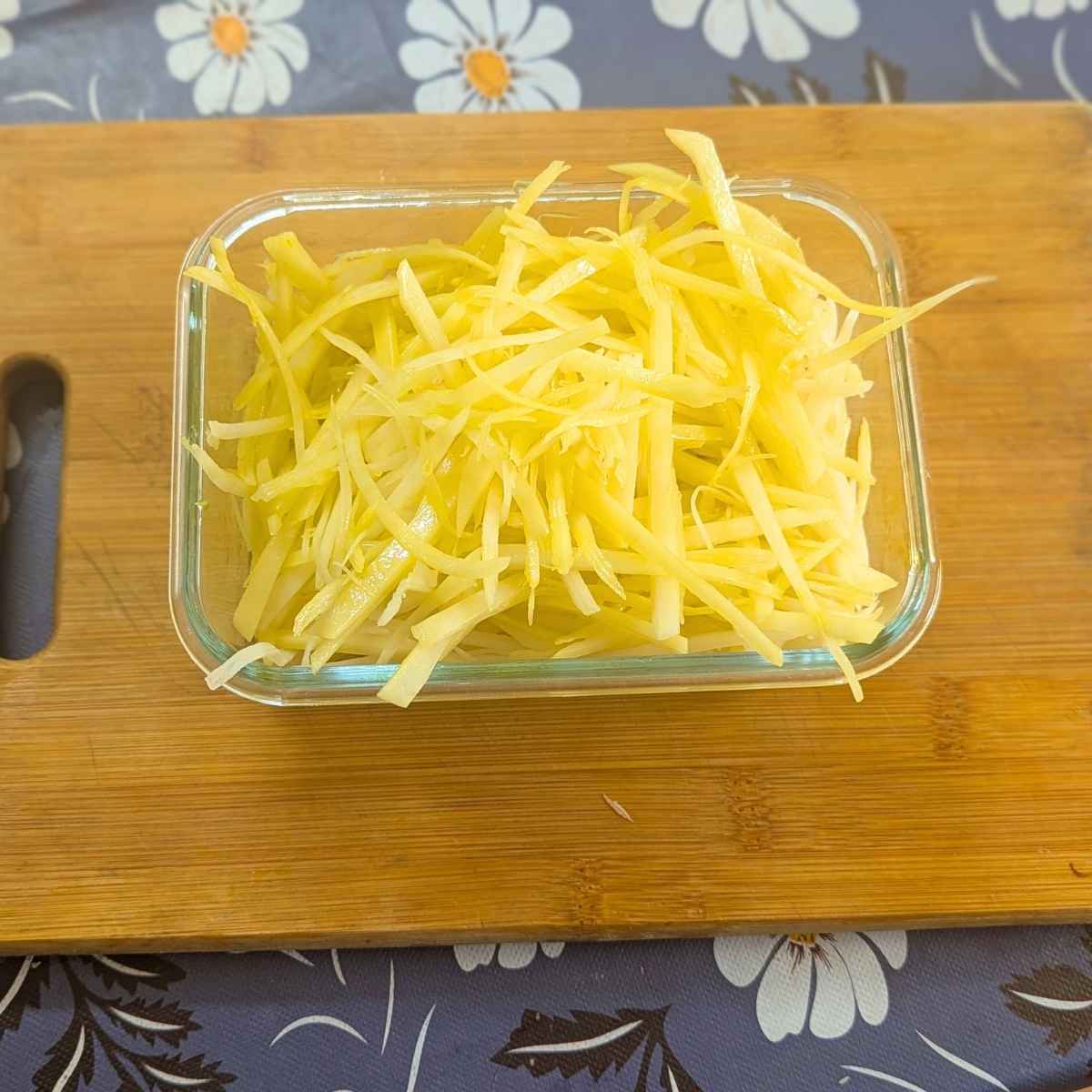 Shoestring fries after drying in a shallow dish