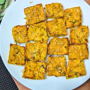 Kothimbir vadi served on a white plate.