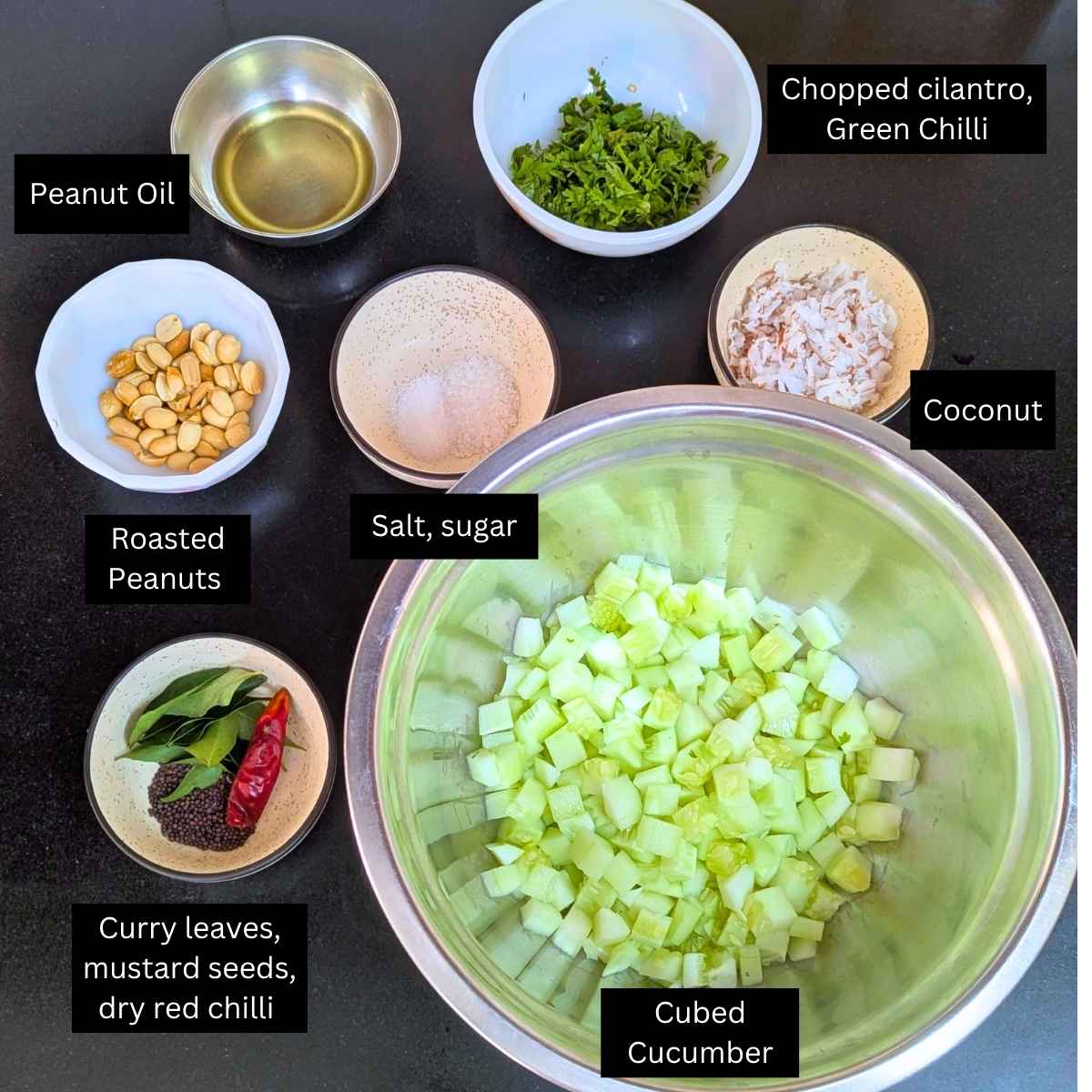 Ingredients for making Indian cucumber salad on a board.
