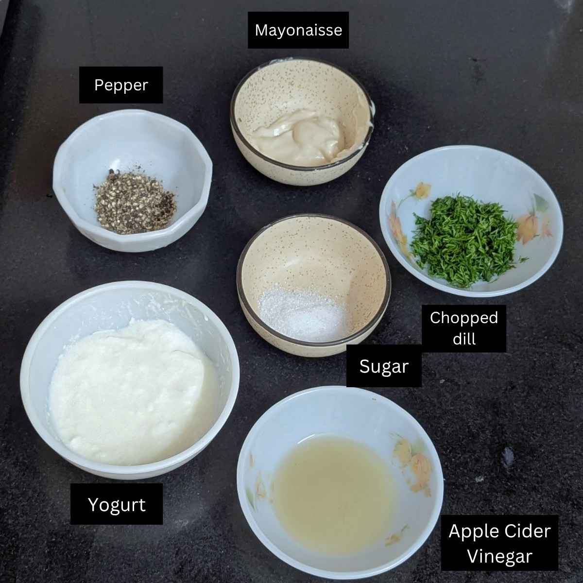 The ingredients for making the dressing of cucumber salad