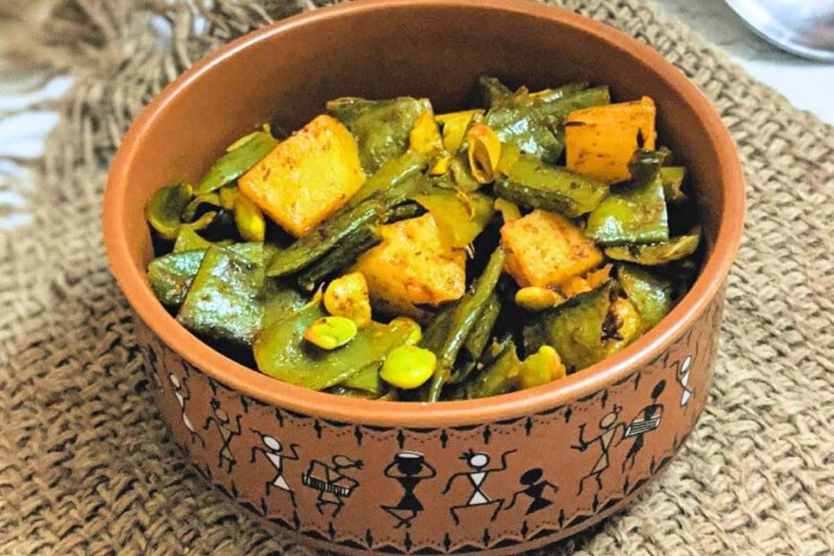 a bowl of aloo sem sabzi
