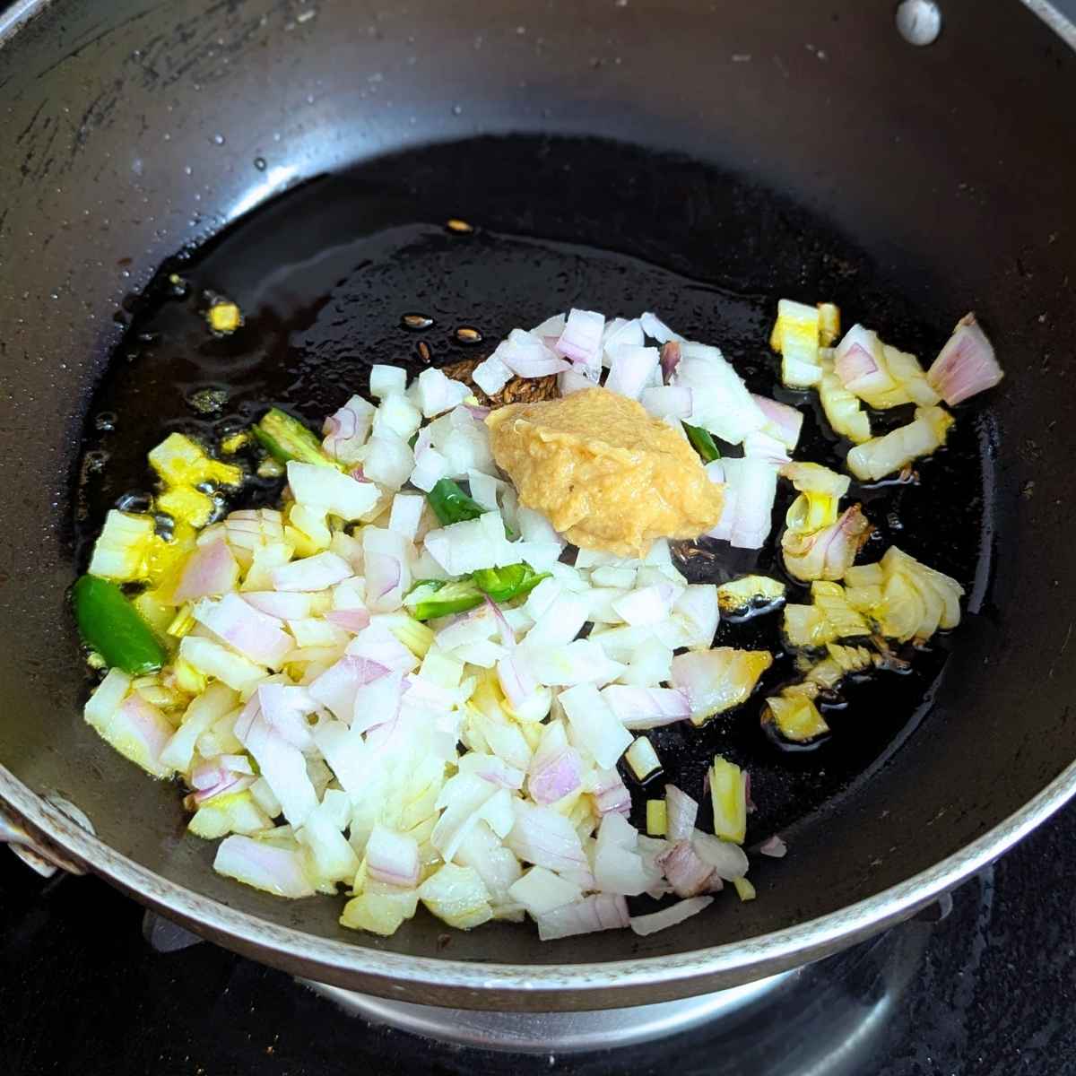 chopped onions, chilli and ginger garlic paste added to the oil.