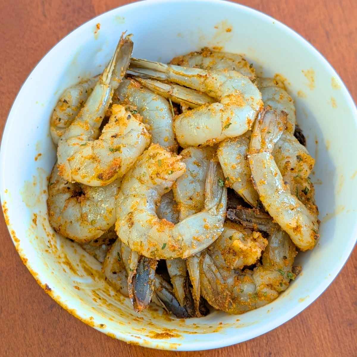 Shrimp tossed with seasonings in olive oil