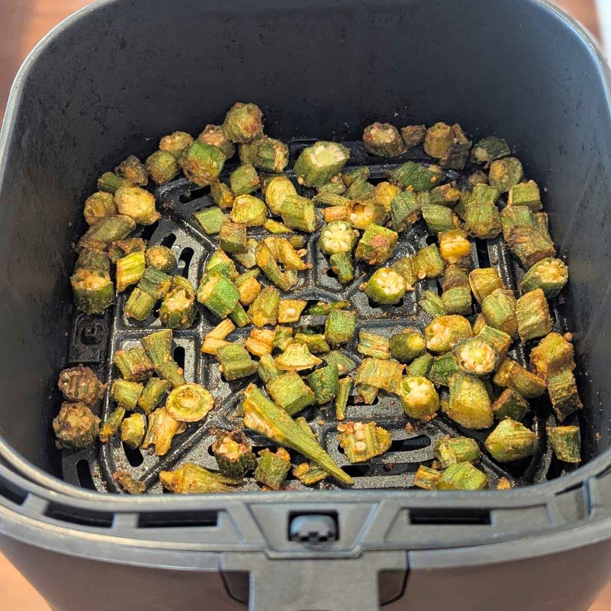 Crispy air fried okra in air fryer basket