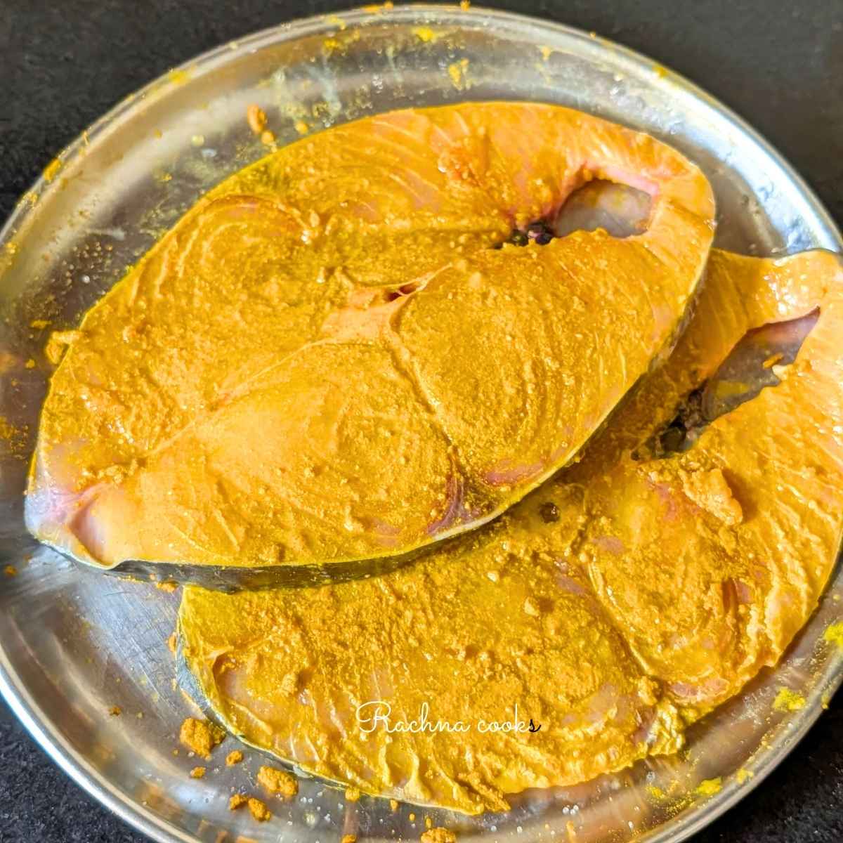 Surmai fillets marinated with turmeric powder, lime juice and salt
