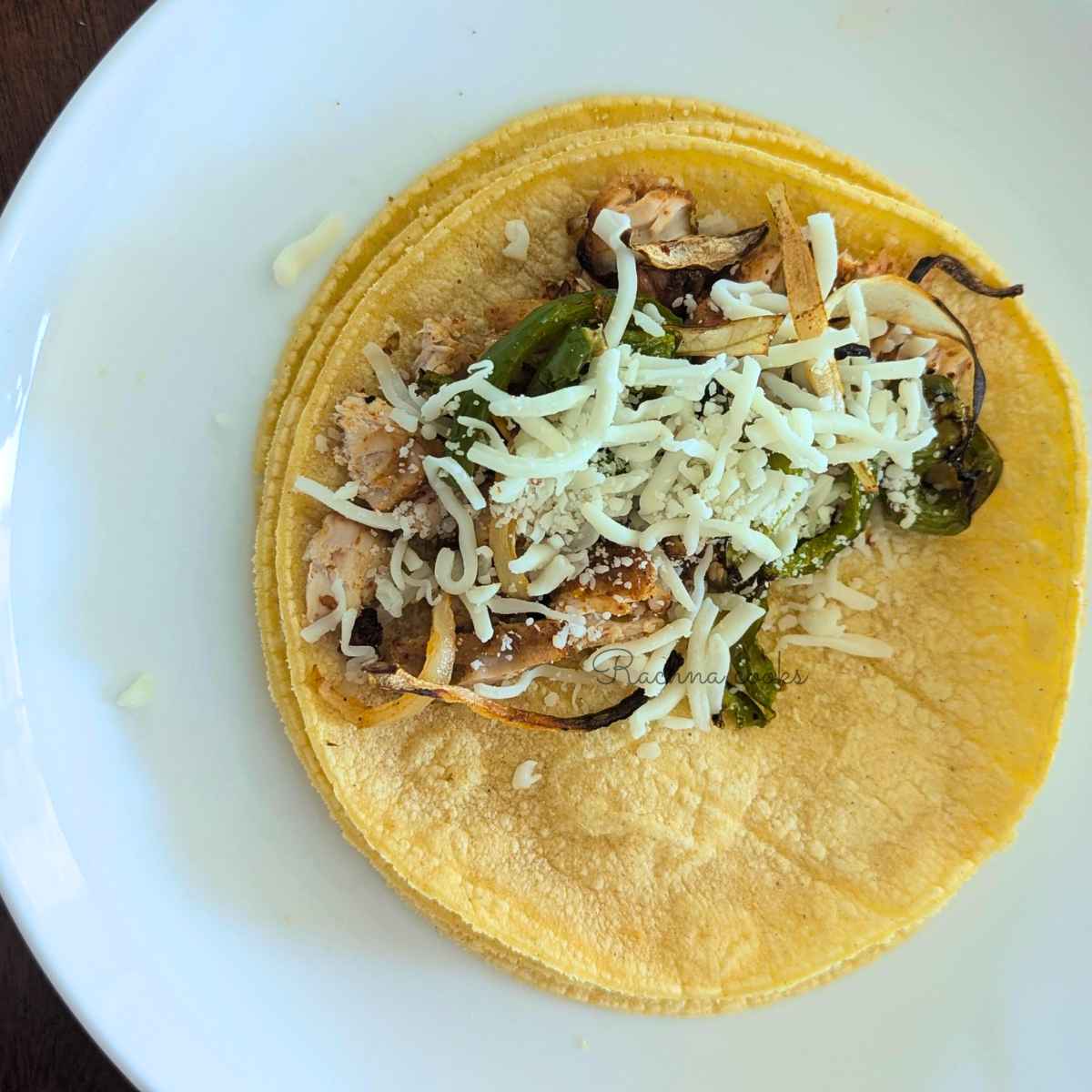 Tacos with fillings and cheese