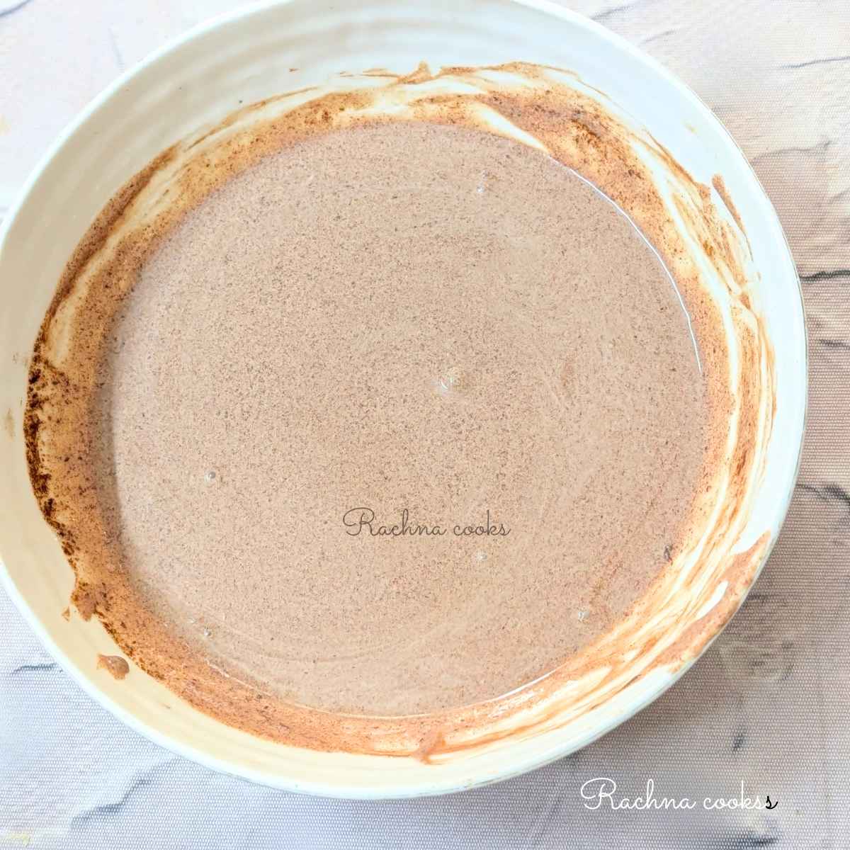 dark chocolate Greek yogurt mixture in a white bowl