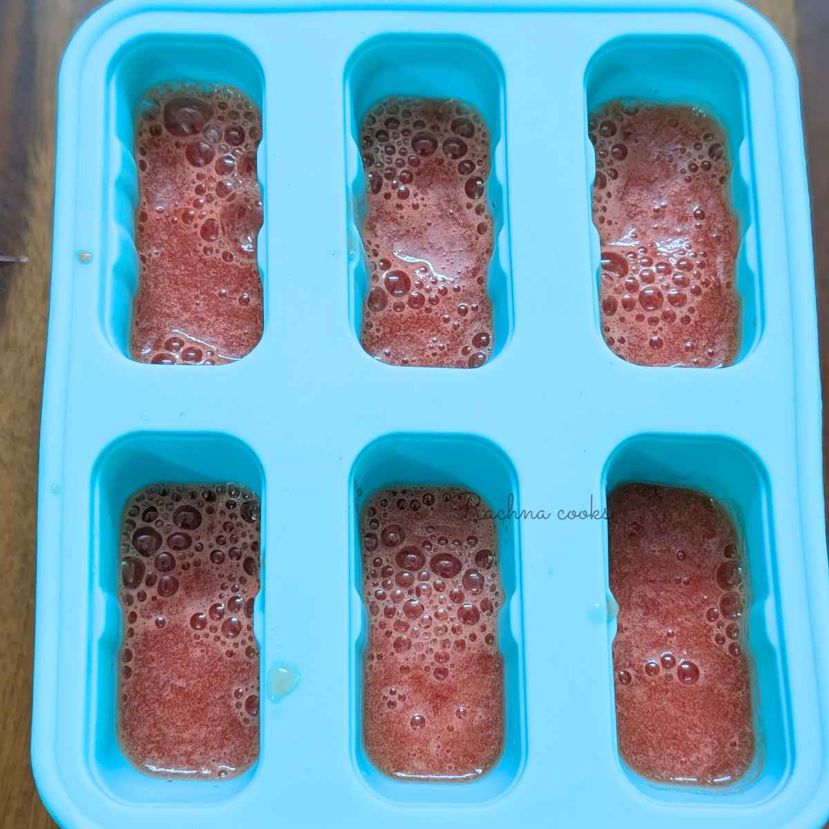 Blended watermelon mix in silicone popsicle molds