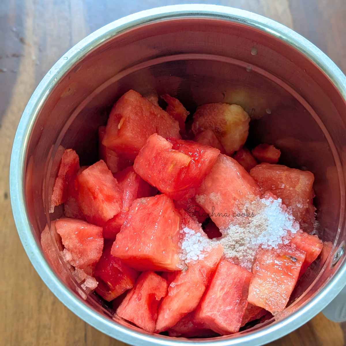 Watermelon cubes with sugar, salt and lemon juice in blender jar