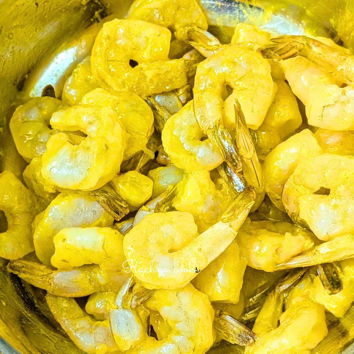 Prawns marinated with turmeric, salt and lemon juice