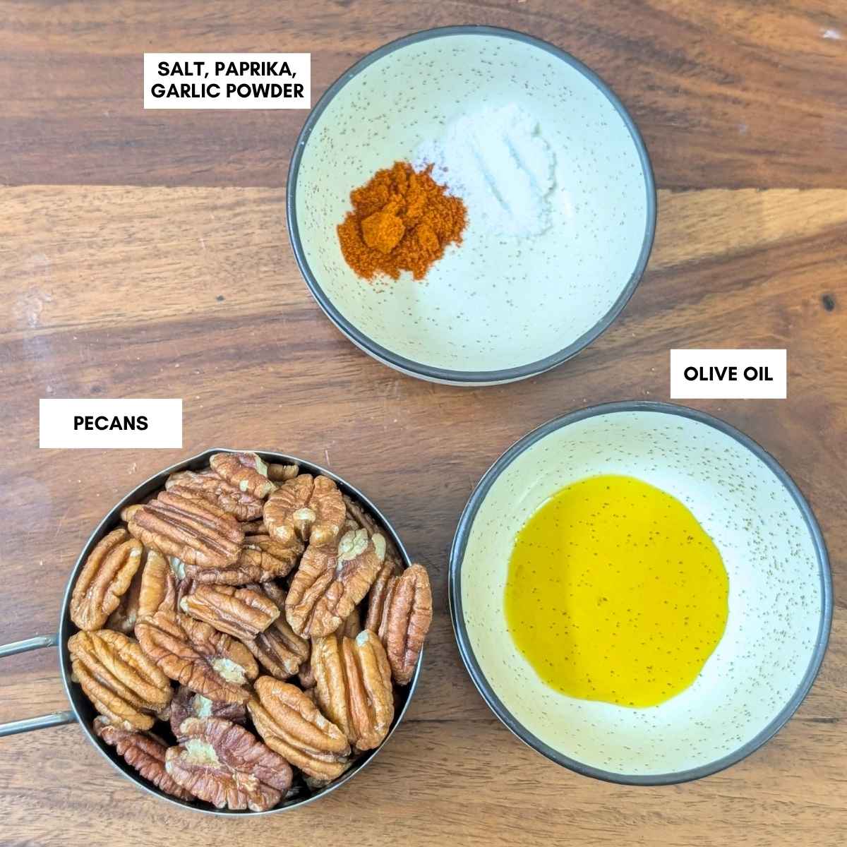 Ingredients for making roasted pecans visible on a tabletop