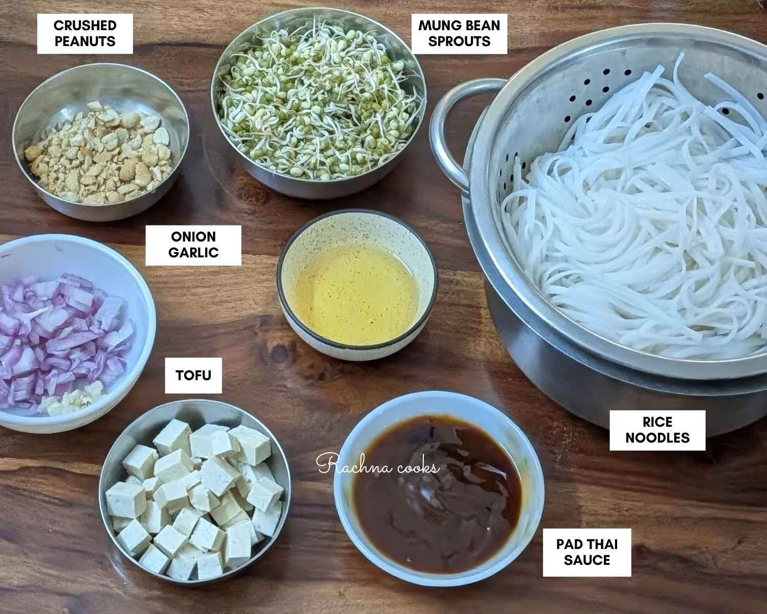 Ingredients for making pad thai noodles on a board